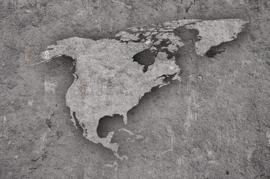 Map of North America on weathered concrete