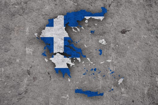 Map and flag of Greece on weathered concrete