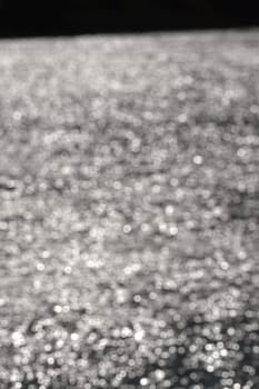 4 - Dense abstract textured bokeh background, vertical image, random bright white blurred pattern effect. outdoors inspiration, defocused technique