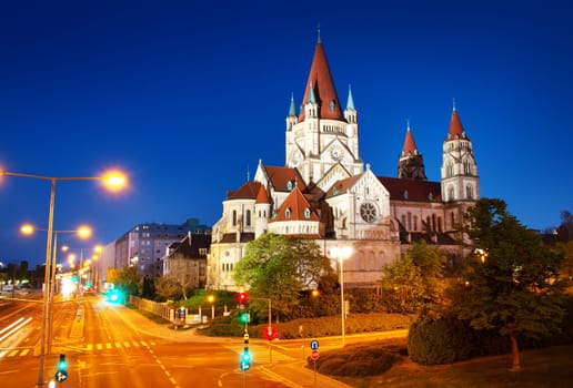 Saint Francis of Assisi Church on Danube in Vienna, Austria at nighttime