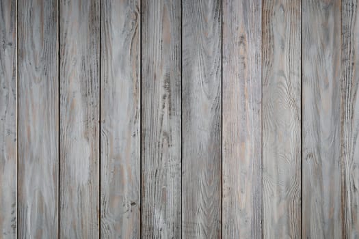 Old wooden planks. Blue background with painted boards