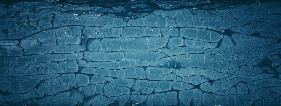 Old blue wooden planks. Rustic background with painted boards. Faded wall texture