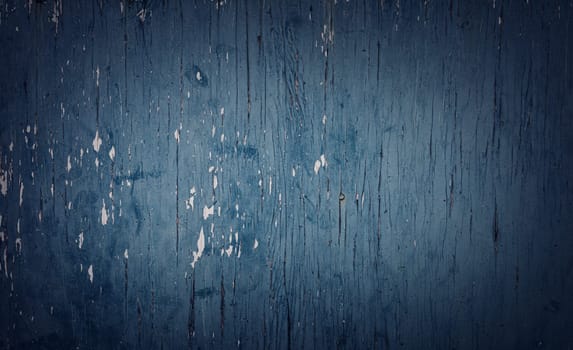 Old blue wooden planks. Rustic background with painted boards. Faded wall texture