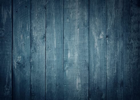 Old blue wooden planks. Rustic background with painted boards. Faded wall texture