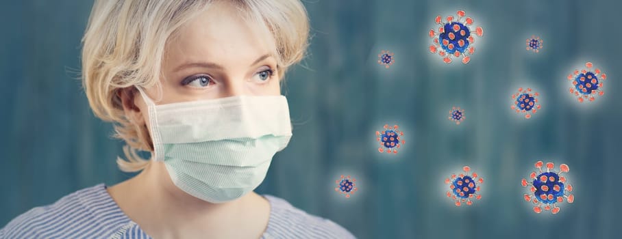 young woman in medical face protection mask indoors on blue background. Sick person