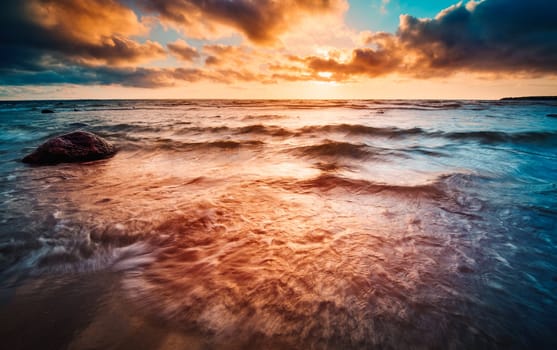 Seascape at sunset with rainy clous on the horizon