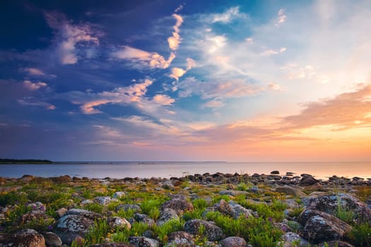 Rocky shores at the sea in beautiful sunset light