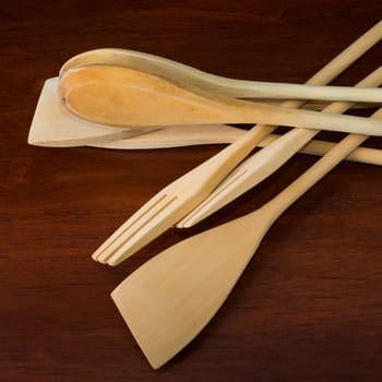 set of colored wooden spoon on a table