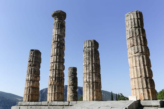 The ruins in Delphi, an archaeological site in Greece at the Mount Parnassus. Delphi is famous by the oracle at the sanctuary dedicated to Apollo. UNESCO World heritage