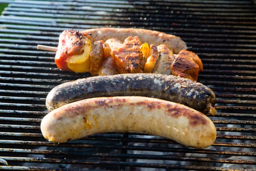 Grilled meat on a summer barbecue in the garden