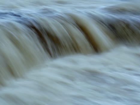 waterfall, water stream dropping over the cliff, long exposure
