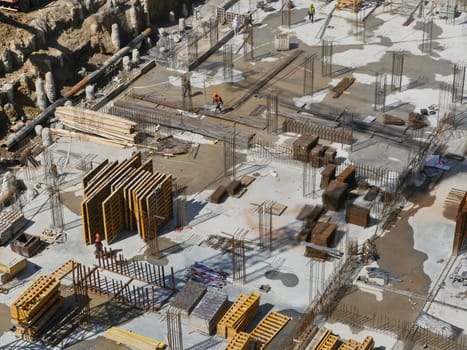 Construction site view from above, the construction of a reinforced concrete building foundation