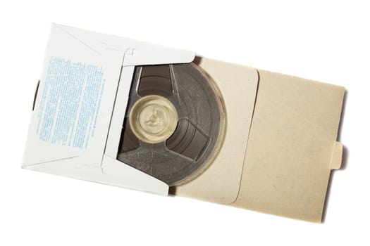 Retro reel to reel tape in a carton box on white background