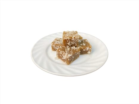 Kueh Kaswi or Kasui (palm brown sugar rice cake) on white background