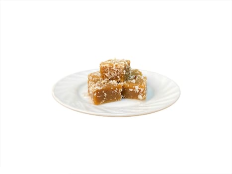 Kueh Kaswi or Kasui (palm brown sugar rice cake) on white background