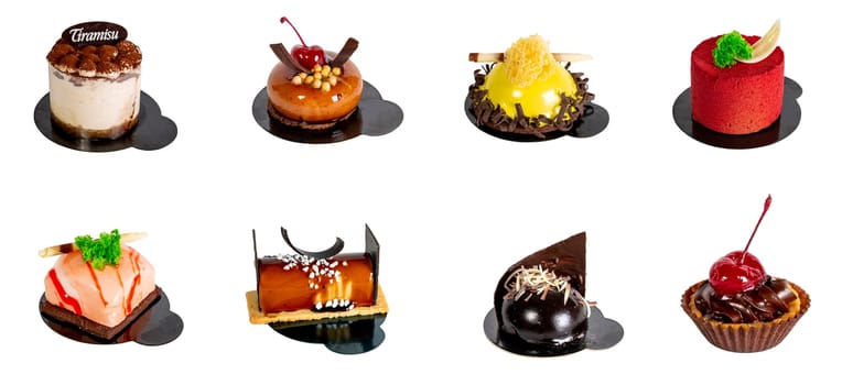 Set of Appetizing cake isolated on a white background on a dark stand. Gourmet cooking. Haute cuisine