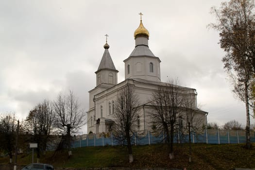 Old white St. Nicholas ortodox Church in Logoisk, Belarus