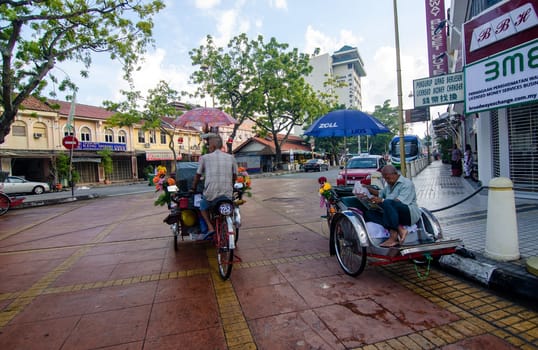 Georgetown, Penang/Malaysia - Jul 31 2016: Trishaw is the traditional transportation of heritage Penang.