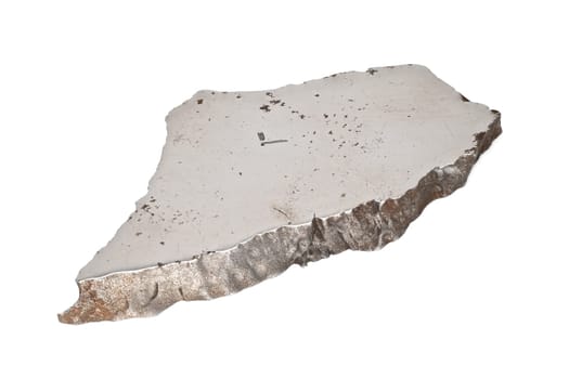 Iron Meteorite Sliced, close up of rock from space on white background