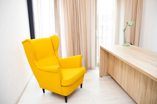 Chief executive or manager office with desk and armchairs, office interior