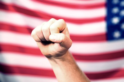 Man's fist over USA flag.United States elections 2020 concept.