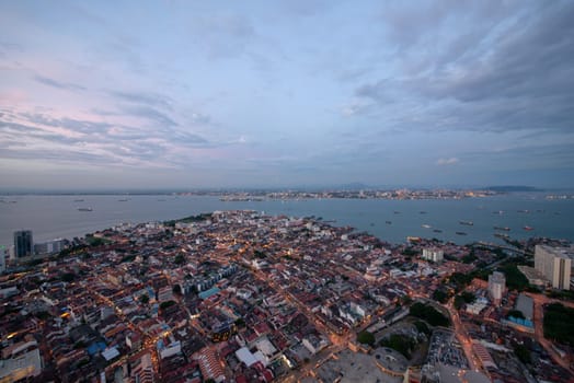George Town, Penang/Malaysia - Jun 18 2017: Sunset hour over Penang Georgetown. Background is Peninsular Malaysia.