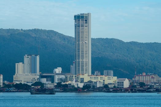 George Town, Penang/Malaysia - Jun 27 2017: KOMTAR building in afternoon from sea.