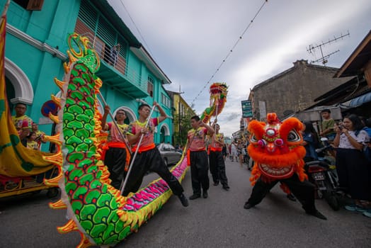 George Town, Penang/Malaysia - Jul 07 2017: Dragon dance and lion dance perform at street.