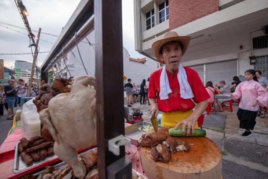 George Town, Penang/Malaysia - Jul 07 2017: Chicken rice seller at street.