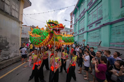 George Town, Penang/Malaysia - Jul 07 2017: Dragon dance parade at street.