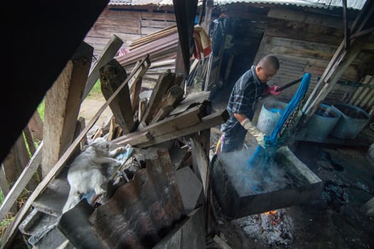 Kota Bahru, Kelantan/Malaysia - Jul 15 2017: Batik washing is one of the batik making process.