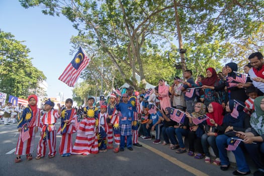 George Town, Penang/Malaysia - Aug 31 2017: Local Malaysian wear jalur gemilang costume to national day celebration.