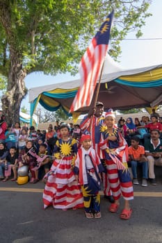 George Town, Penang/Malaysia - Aug 31 2017: Malaysian wear Malaysia flag costume celebrate national day together.