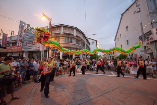 George Town, Penang/Malaysia - Jul 07 2017: Group of men perform dragon dance.