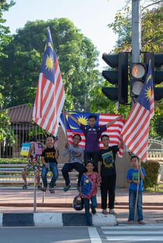 George Town, Penang/Malaysia - Aug 31 2017: Patriotic kids enjoy national day celebration.
