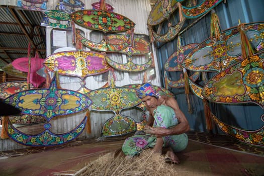 Kota Bahru, Kelantan/Malaysia - Jul 15 2017: A man make wau bulan at workshop.