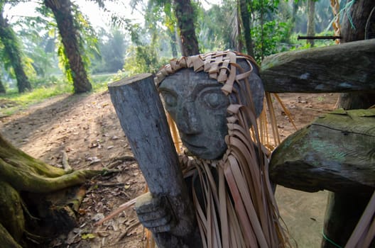 Carey Island, Selangor/Malaysia - Mar 17 2018: Mah Meri sculpture in oil palm estate.