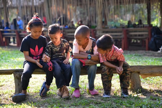 Carey Island, Selangor/Malaysia - Mar 17 2018: Malaysia aboriginal Mah Meri kid at outdoor.