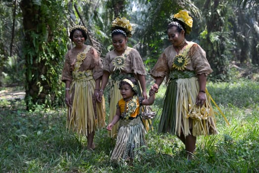 Carey Island, Selangor/Malaysia - Mar 17 2018: Villager Mah Meri in oil palm estate.