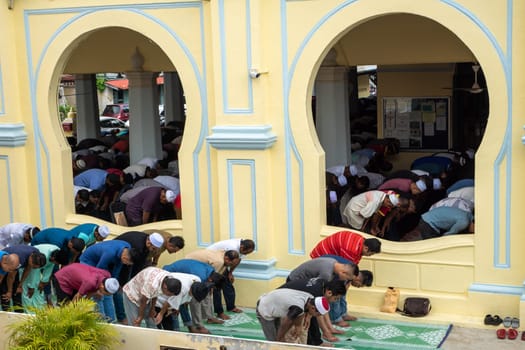 George Town, Penang/Malaysia - Jul 19 2018: Acheh Mosque with Muslim praying.