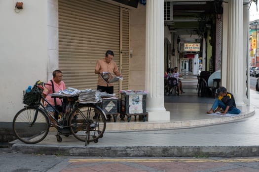 George Town, Penang/Malaysia - Jul 19 2018: Street life of different people at Georgetown
