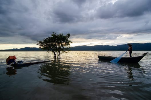 Timah Lake Tasoh, Perlis/Malaysia - Oct 24 2018: A fisherman catch fish at Timah Tasoh Lake.