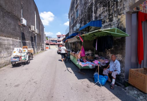Bukit Mertajam, Penang/Malaysia - Jun 14 2019: Clothes seller at street.