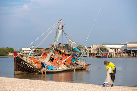 Sekinchan, Selangor/Malaysia - Oct 06 2019: A Malays fishing at the coastal.