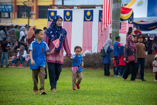 Butterworth, Penang/Malaysia - Aug 31 2019: A Malays family attend Merdeka celebration.