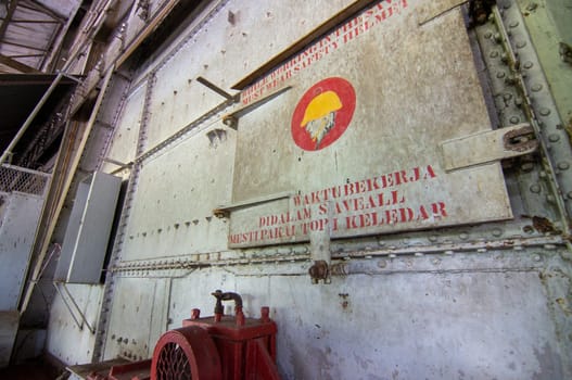 Tanjung Tualang, Perak/Malaysia - Oct 07 2019: Safety sign wear safety helmet in tin Dredge No. 5