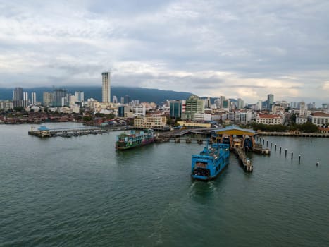 George Town, Penang/Malaysia - Oct 23 2019: Blue ferry at terminal Georgetown.