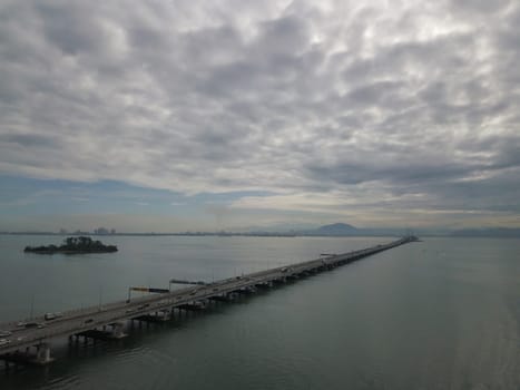 George Town, Penang/Malaysia - Oct 24 2019: Aerial Penang Bridge in cloudy day.
