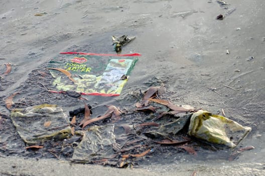 Batu Maung, Penang/Malaysia - Dec 28 2019: Food plastic found at sea coastal.