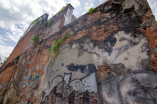 George Town, Penang/Malaysia - Nov 11 2019: Mural Bruce Lee kick with leg at street.